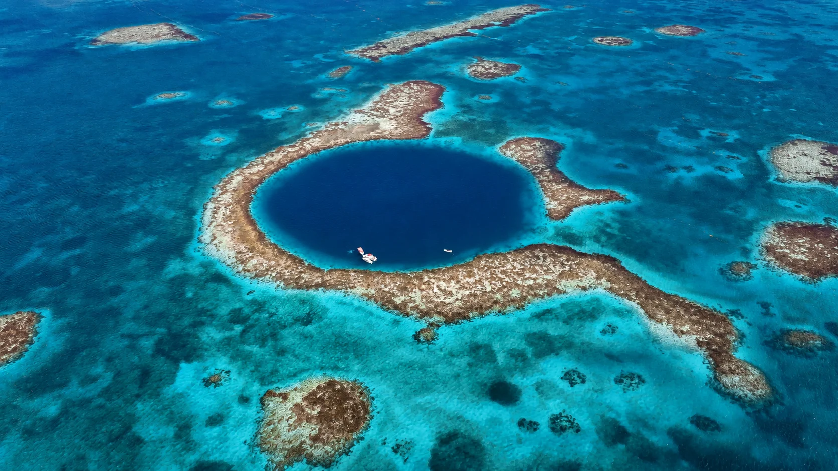 The Great Blue Hole at Lighthouse Reef, an optional offshore day trip